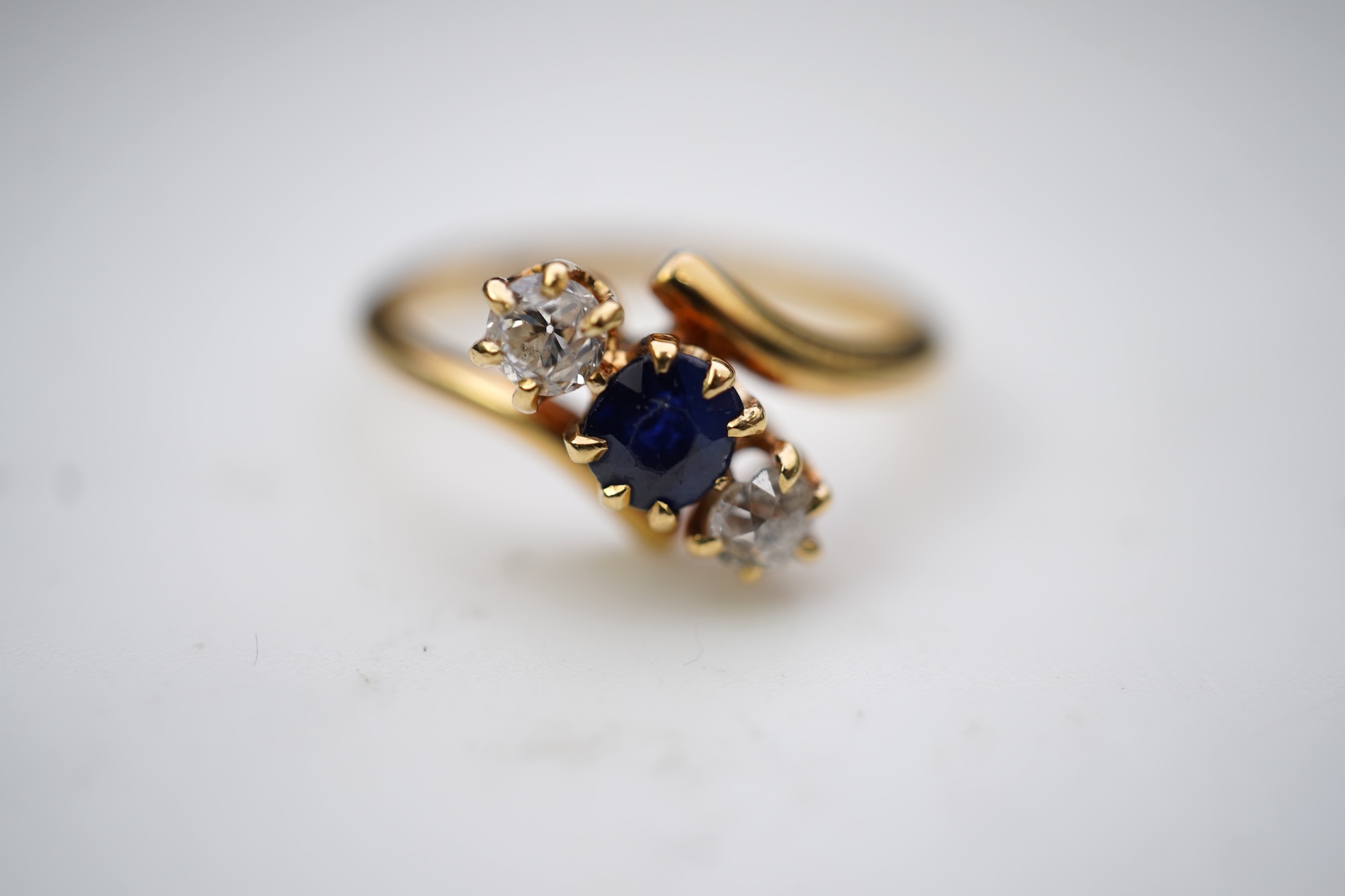 A sapphire and diamond three-stone ring, early 20th century